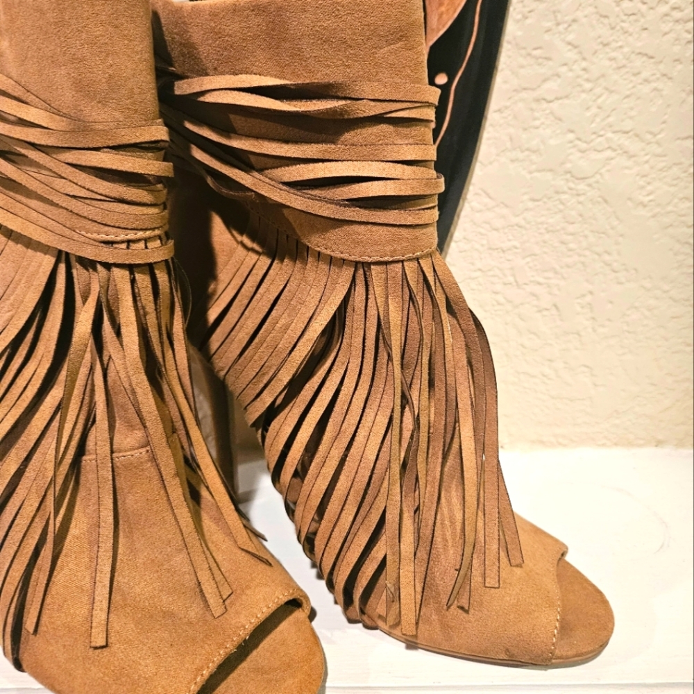 Tan fringed high heels